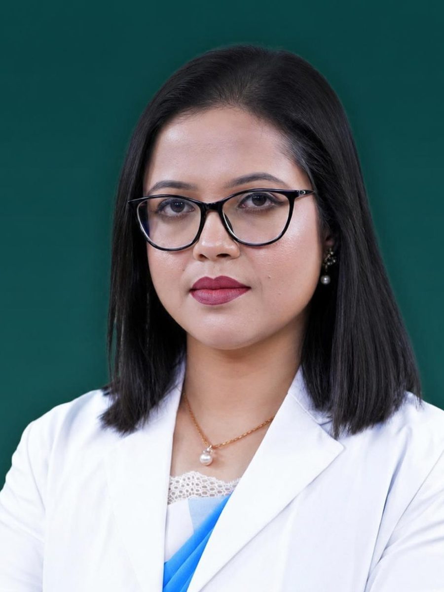 Head-and-shoulders portrait of Dr. Sifat-E-Aman in a white doctor's coat and glasses, against a dark green background.